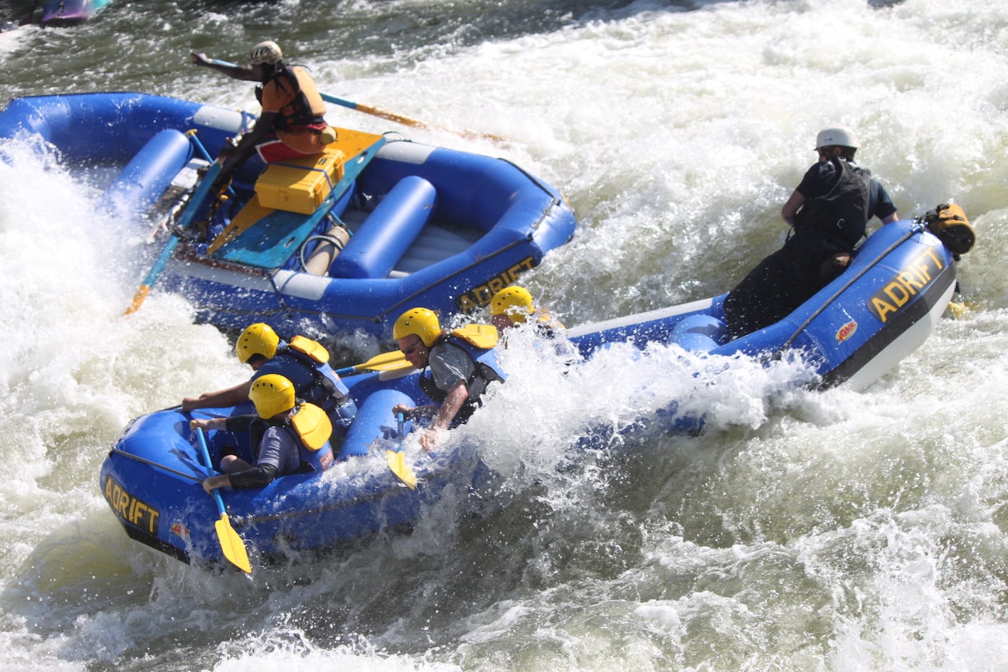 Adrift white water rafting